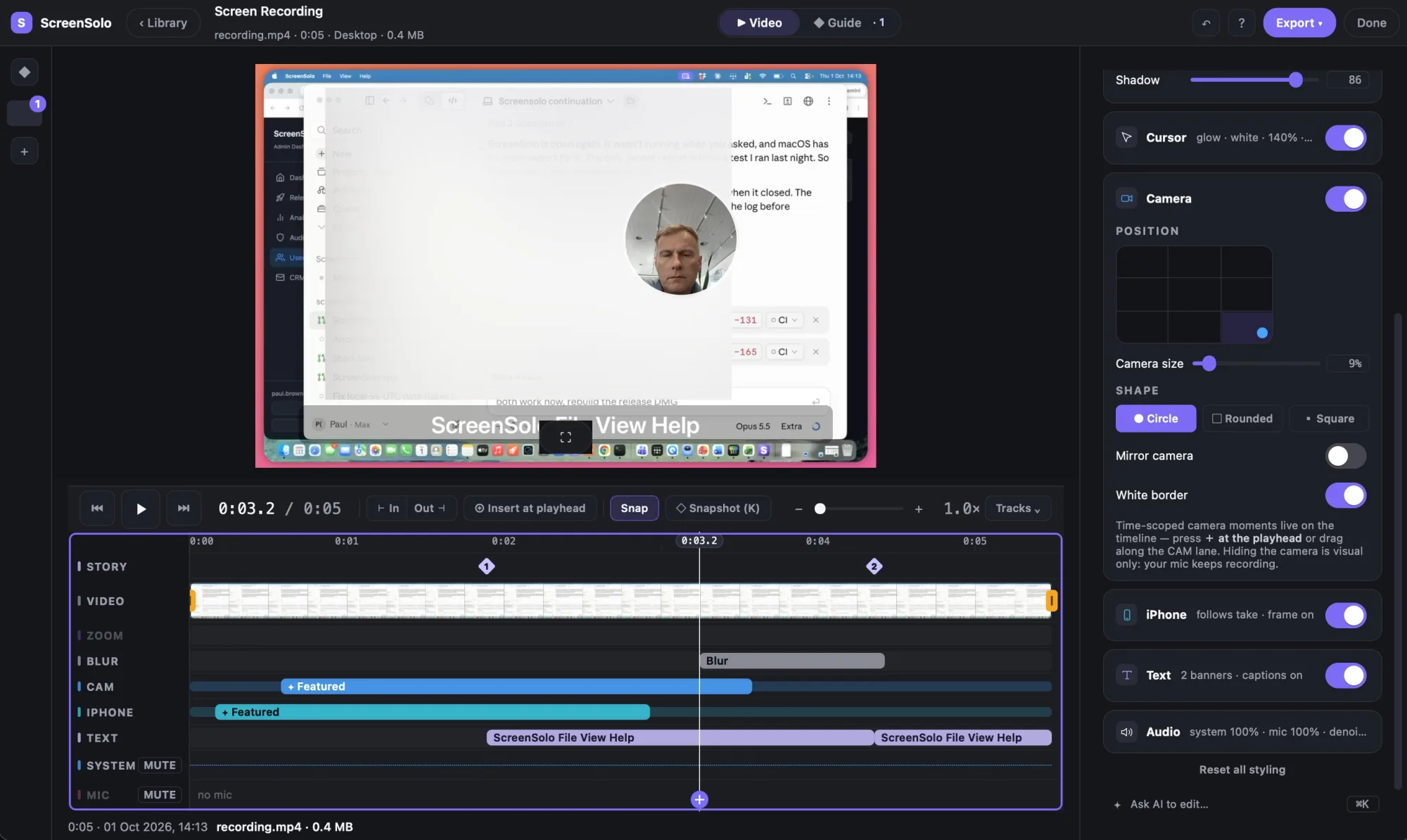 The ScreenSolo editor. Top bar: Video | Guide output switch, Export and Done. Centre: the recording with the camera bubble. Below: a timeline with Story, Video, Zoom, Blur, Cam, iPhone, Text, System and Mic lanes. Right: Cursor, Camera position, iPhone, Text and Audio panels, and an Ask AI to edit field.